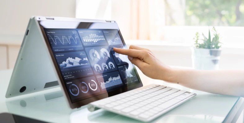 A_touchscreen_laptop_displaying_data_analytics_dashboards