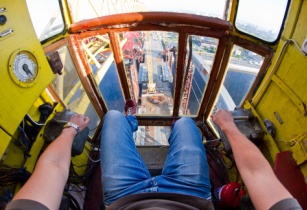 PEMAs report focuses on how to improve RTG and container crane cabin ergonomics and safety. (Image source: Adobe Stock)
